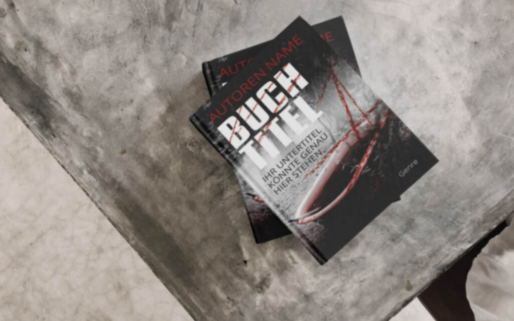 Zwei Bücher liegen auf einer Beton-Tischplatte.